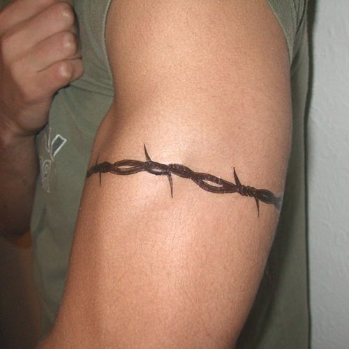 Black Ink Barbed Wire Tattoo On Left Sleeve